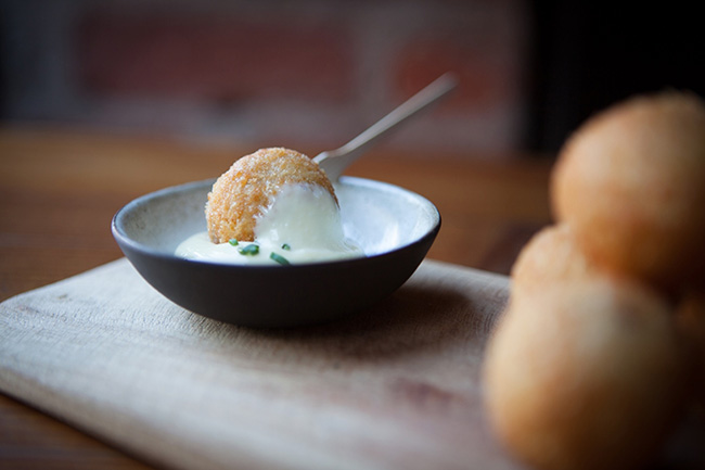 Start with the arancini (risotto balls), served with a delicious, garlicky aioli