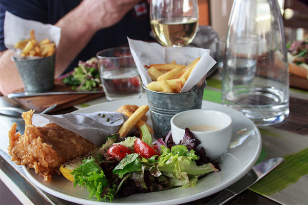 Beer battered hake and chips served with a mix garden salad and tartare sauce