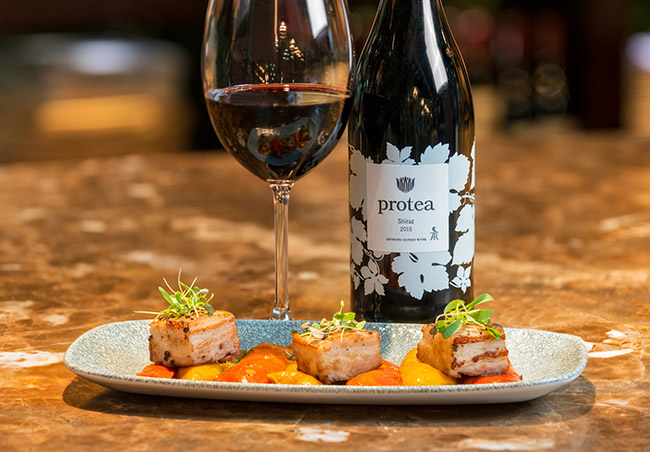Protea Shiraz paired with pork belly.