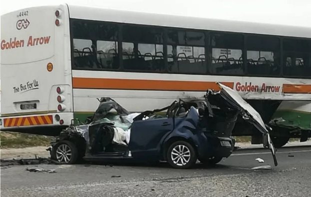 Two killed after car is wedged under bus