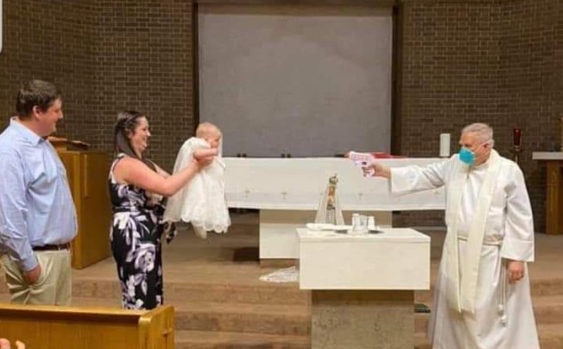 US priest baptises baby with water gun