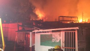 Fire burns through homes in Imizamo Yethu