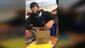 Windsor High School students surprise classmate with a new smartphone