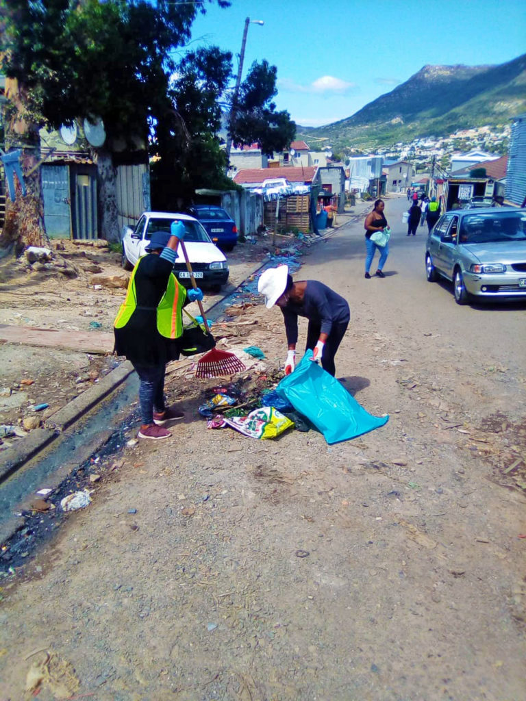 Imizamo Yethu volunteers clean up the community