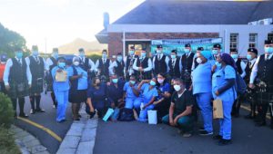 False Bay Hospital workers and patients receive Highlanders salute