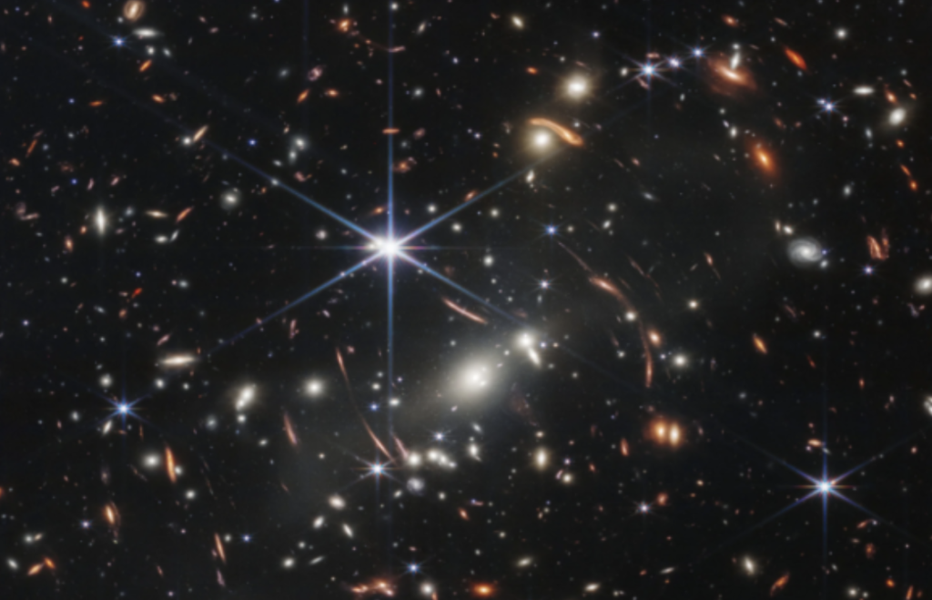 Look! NASA reveals first full-colour galaxy cluster photo