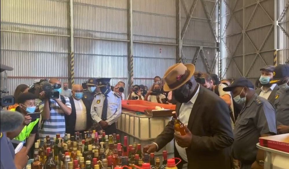 WATCH: Bheki Cele destroys tons of confiscated booze in the Cape