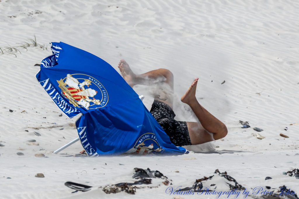 Look! Hilarious snaps of a man versus an umbrella in Cape Town