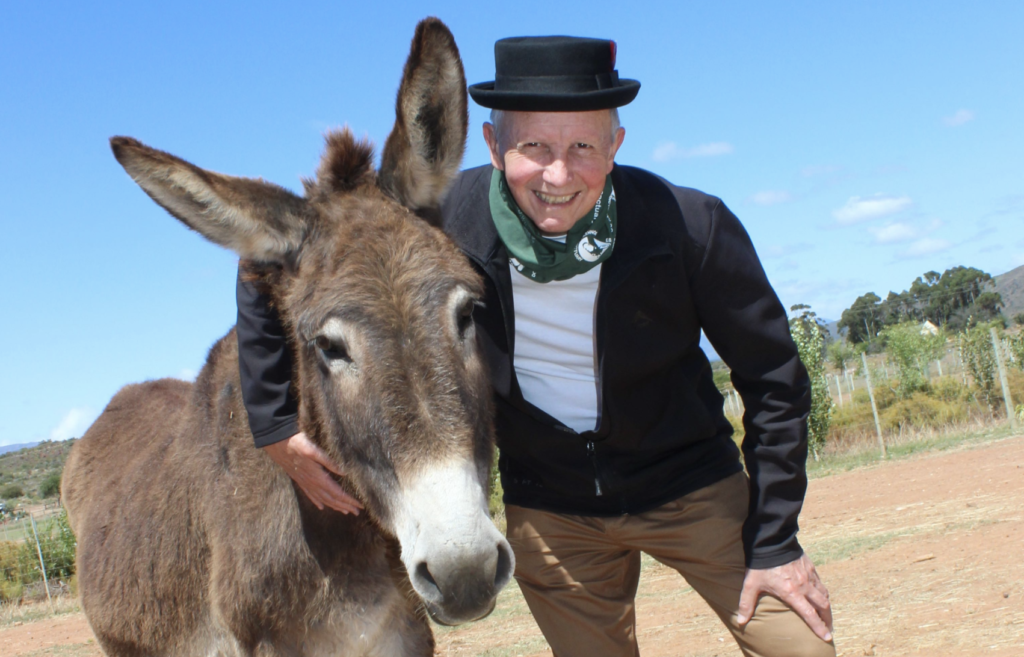 Local legend David Kramer writes a song for rescued donkeys