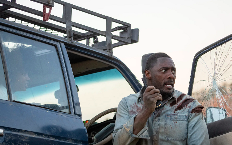 Idris Elba squares off with a bloodthirsty lion with SA as the backdrop