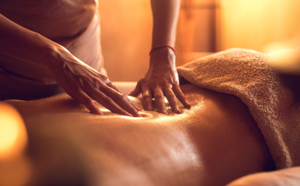 Headmasters group massage spa image of woman being masssaged