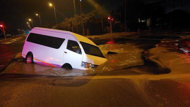 Pictures: Cape Town taxi goes for swim thanks to massive sinkhole