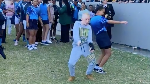 Watch! A vibey schoolboy goes viral taking centre stage in a dance battle