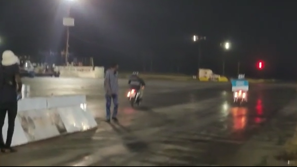 Watch: Two motorbike delivery drivers go drag racing