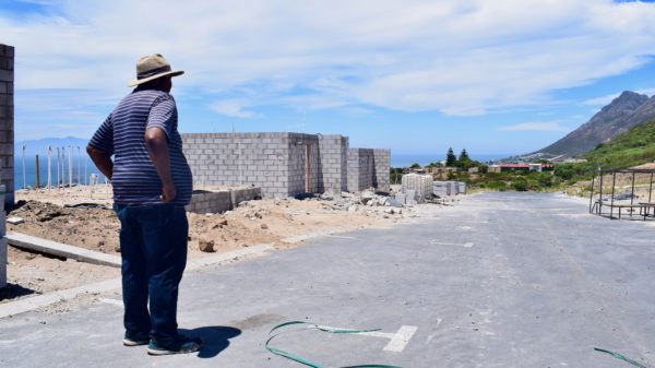 Broadhurst Cona looks out at the Dido Valley housing project with its view of False Bay. Photo: Lucas Nowicki