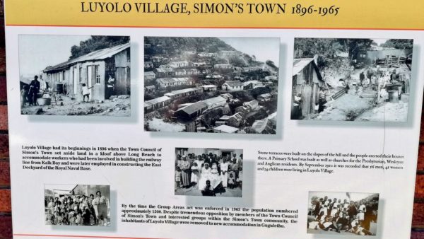 A commemorative plaque with photos from the Simon’s Town Museum of historical Luyolo. Photo: Graeme Raubenheimer
