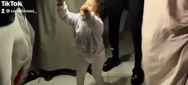 child dancing during loadshedding