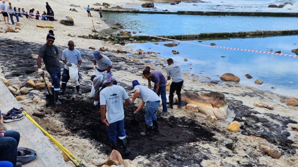 City cleaning up suspected oil spill exposed at St James Beach