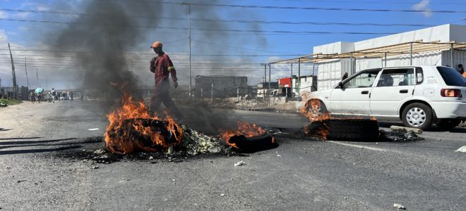 Potsdam Road in Dunoon was blocked with rubble and burning tyres by protesting community members on Tuesday. Photos: Peter Luhanga