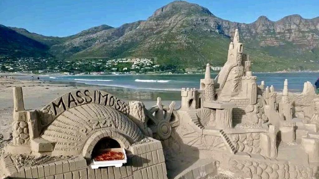 Local sand artist creates incredible pizza oven for Massimo's