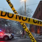 Brown University shooting victims named as gunman remains at large